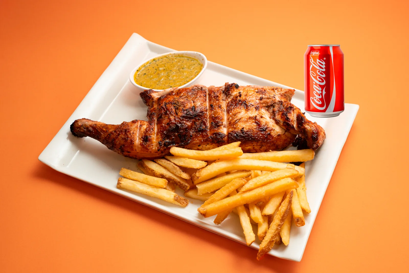 Medio pollo con patatas